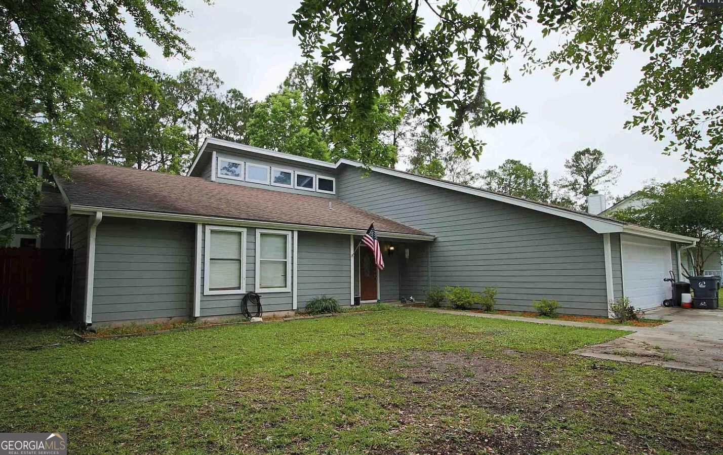 Welcome to your dream home! This delightful 3-bedroom, 2.5-bathroom ranch-style residence, featuring classic wood siding, offers the perfect blend of comfort and convenience. Step inside and discover a spacious layout designed for modern living. The inviting living area, complete with a cozy fireplace, is perfect for relaxing evenings. The well-appointed kitchen boasts a convenient pantry for all your storage needs. Enjoy the outdoors on your lovely front porch or entertain guests on the expansive back patio overlooking the fenced-in yard-ideal for pets, play, and privacy. Location is everything, and this home delivers! You'll be just minutes away from river access, perfect for outdoor enthusiasts. Plus, you're incredibly close to schools, a variety of dining options, and excellent shopping, making everyday errands a breeze. With a two-car garage, you'll have ample space for vehicles and storage. Don't miss the opportunity to make this charming ranch yours!