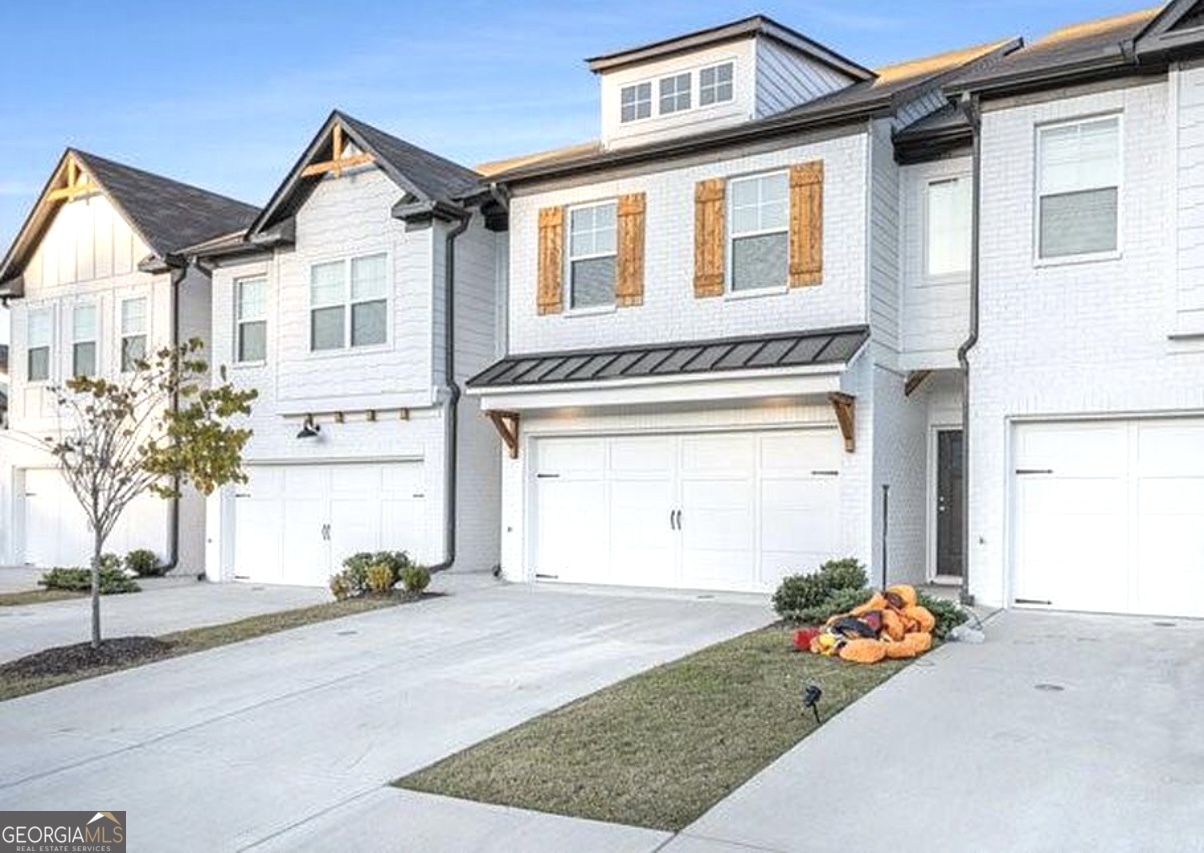 GREAT DEAL,PRICE REDUCED TO SELL! FOR INVESTORS - NO RENTAL RESTRICTIONS!! MODERN FARMHOUSE STYLE 3B/2.5B townhome with Large LOFT Area, 2 Car Garage and a fully fenced backyard with Patio. Well maintained 2022 built as good as new with upscale finishes, open floor plan and stainless-steel appliances. Key Highlights: 1. This Townhouse faces directly the community Pool and Playground providing beautiful views and convenient access. 2. This floor plan has larger living area 3. Brand New Appliances, Refrigerator, Samsung BESPOKE 23 cu. ft Smart Refrigerator with Beverage Center 4. Private Fully Fenced Backyard with Patio 5. Highly Desirable Location: Situated in a very sought after Cannon Trace Subdivision: a) Minutes to Highway 316 and Interstate 85. b) Few minutes from Walmart Supercenter, Home Depot, ALDI, Publix and Ingles c) 4 minutes of drive to the vibrant Winder downtown shops and dining. d) 5 minutes of drive to the "Winder Legacy Park" e) 7 minutes of drive to Northeast Georgia Medical Center. f) Short Drive to Mall of Georgia. g) 14 minutes to the Famous Chateau Elan Winery and Resort.