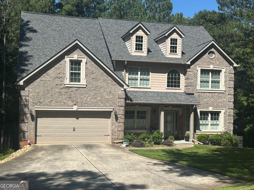 Gorgeous, immaculate, elegant, and beautiful home, with a 3-sided brick wall and concrete siding, situated in a quiet neighborhood. Property is seated on a one (1.7) acre of land, with no HOA restrictions! Gain access into the property through a spacious foyer/hallway with gleaming hardwood floor, into a 20-foot cathedral ceiling in the family living room, with a gorgeous fireplace. First room on the right with a French-door as you work into the building, could serve as home office as well. Directly across the hall is the dining room space, perfect for entertainment and making memories. Main floor has a self-contain private room that could serve as a guest room or an overflow of space. There is enough illumination all around the house. Master-chef Kitchen comes with all stainless-steel appliances, granite countertops and tile back-splash. Kitchen also comes with upgraded designed kitchen island with built-in shelves for additional storage, built-in cutting board. Seller added this designed kitchen Island after purchase. Work-in pantry. Wooded floor throughout main level and up to the kitchen area. The family room shows the beautiful stylish staircase that leads to the various bedrooms upstairs. Two (2) secondary bedrooms connected by a Jack & Jill bathroom with a private area. The large, oversized master suite, complete with it's luxurious master bedroom, and its own sitting area, comes with an attractive double trey ceiling that accentuates the open and spacious area. Large spacious master bathroom with a jetted soaking tub and a glass shower area. Master bath with multi-level double vanity with knee space for a stool. Master suite also has a spacious work-in closet. His & Hers wash area. The deck off the breakfast area overlooking the private and wooded backyard, with full basement. The backyard space for BBQ, exploring and catching a glimpse of wildlife. It's a place to behold and to call a home. Also, seller is leaving porcelain tile for the new home owners to complete the basement floors.