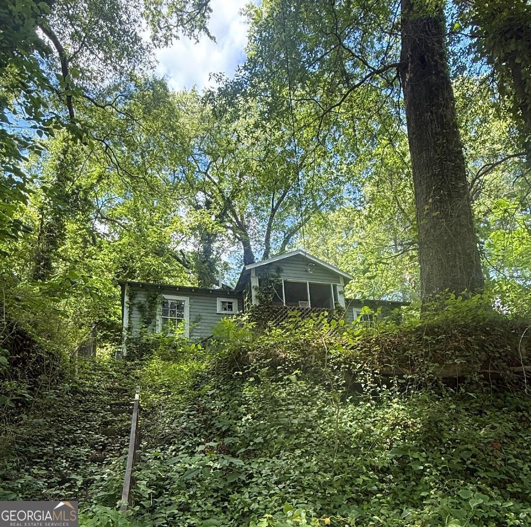 Investment opportunity! With this .31-acre lot there is an existing home on property built in 1920. Less than 5 minutes from Broad Street. Structure is in need of full renovation or tear down. Being sold "AS IS" "WHERE IS"