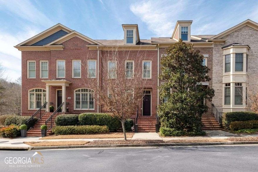High-end townhome in coveted One River Place, located in the city of Sandy Springs! This one is sure to check off the boxes - 4 bedrooms, or 3 bedrooms with a flex space on the fourth level, this townhome is one of the larger floor plans and has many offerings for you to make your own. Upon entry, you are greeted with a bright and welcoming foyer that opens to the oversized dining room and main living area. The large kitchen features stainless steel appliances, granite countertops, and an island with plenty of workspace and room to gather. Built-in bookshelves showcase the fireplace in the living room and allow an inviting space for you to unwind after a long day. If that doesn't do it for you, the deck is a great place to relax as you watch the sun go down in this east/west-facing home. Upstairs, the primary suite features upgraded insulated windows to provide a quiet night's rest and a well-appointed en suite with a soaking tub, separate shower, and a large custom walk-in closet. The remaining bedrooms are all equally spacious and include private en-suites and walk-in closets. What makes this townhome even more appealing is the community! One River Place is a gated community with convenient access to 285 while also providing the amenities to make you feel like you are living on a permanent vacation. You're steps away from the clubhouse that features a double-sided fireplace, coffee bar, meeting room, state-of-the-art gym, outdoor fire pit with a grilling area, two saltwater pools, a relaxation room, spa service room, guest suite, and fenced dog park with canine turf. Pedestrian gates make it easy for you to walk to Mojave and Ray's on the River. And the proximity to Cochran Shoals path and Chattahoochee River enables you to live a life that embraces nature while enjoying the luxury of all One River Place has to offer!