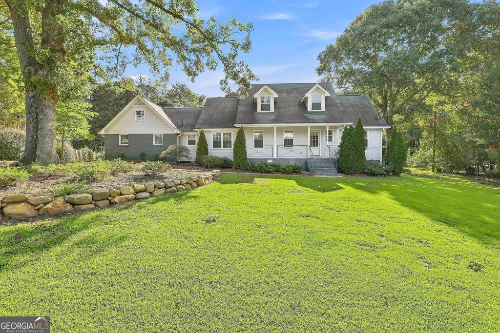 Photo of 1060 Oak Ridge Drive, Fayetteville, GA 30214 (MLS # 10827516)