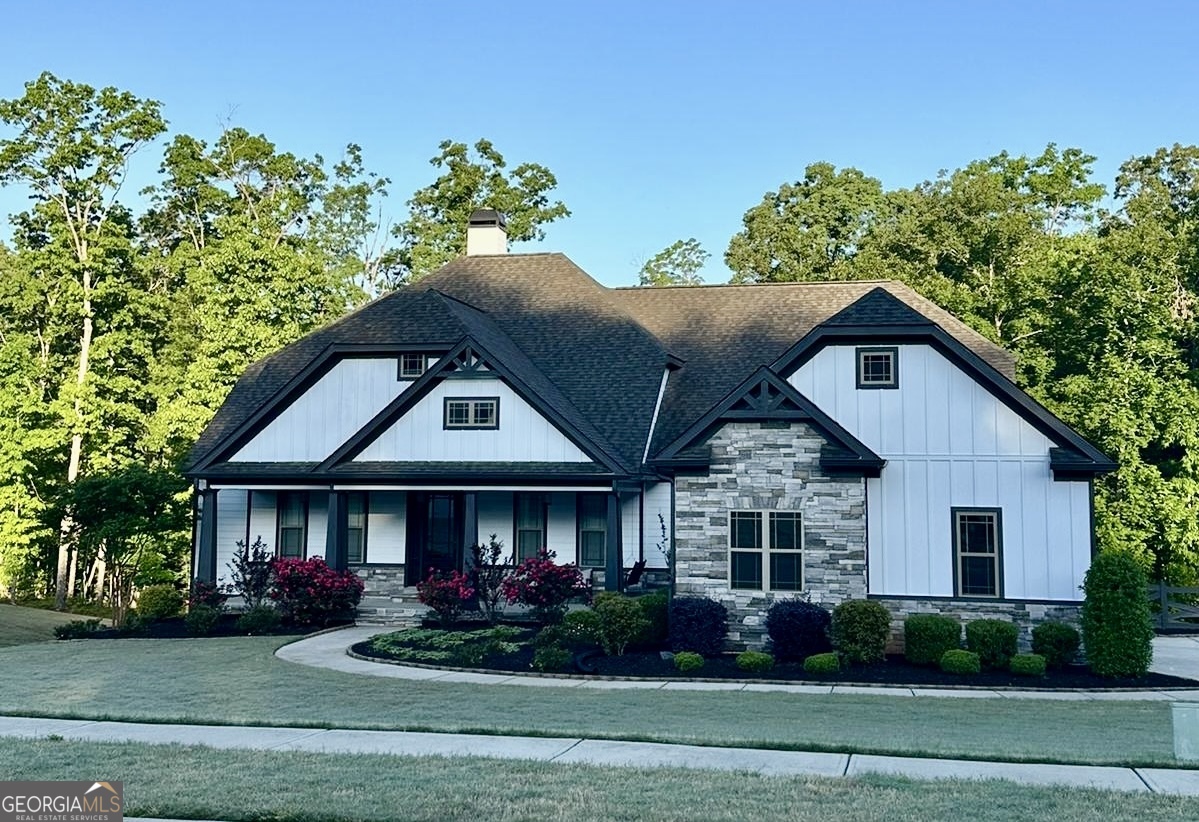 Here is your chance to live in the beautiful Canoe Club. The home is a ranch-style home that has a generous upstairs and an amazing basement. This gorgeous, newer home, built in 2018, is a page out of "Home Designer Magazine" with its four bedrooms and 3.5 baths. Open, bright, and oversized best describe the theme. The kitchen is quite oversized and is the center of the home-open floor plan at its finest. The oversized primary suite on the main level is a true retreat with the most enormous walk-in closet. The home is spread out nicely: the Primary bedroom on one side, two secondary bedrooms on the main level, upstairs w/full bath, and a basement livingroom and office. There is no bathroom in the basement. The back deck is the entire length of the house. Rental requirements: 3Xs the rental rate monthly income, credit score in the 700's. The Canoe Club is a high-end subdivision with great amenities, situated minutes from Peachtree City and Fayetteville. Only 1 mile to Trilith Studio. 12-month lease minimum and 18 months preferred. Walk-through video available upon request. Available October 1st.