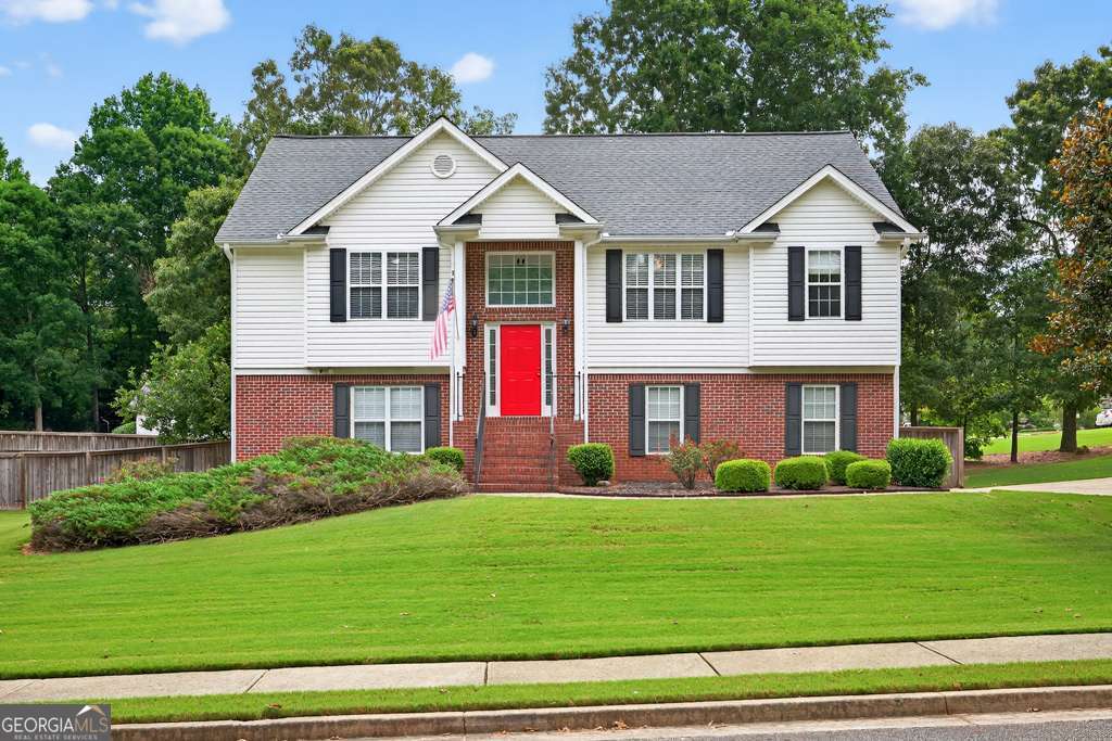 Welcome home to this spacious 4-bedroom split-foyer in the sought-after Jefferson Plantation neighborhood! Located in the desirable Atha, Youth, and Walnut Grove school district, this home offers the perfect blend of space, comfort, and convenience. Upstairs you'll find three generously sized bedrooms, including the primary suite with its own en-suite bathroom featuring double vanities, a separate tub and shower, and plenty of natural light. Enjoy cooking or hosting in your kitchen with views to the living room, double wall oven, gas cooktop, and pantry! Downstairs offers even more flexibility with a separate entrance, a fourth bedroom, full bathroom, and a second living area-perfect for a teen suite, in-law space, home office, or guest retreat. Sitting on a corner lot, the property features a large backyard, great for kids, pets, or entertaining, and a spacious deck that's ideal for summer BBQs and evening relaxation.Don't miss this opportunity to live in one of the area's most established and friendly neighborhoods!