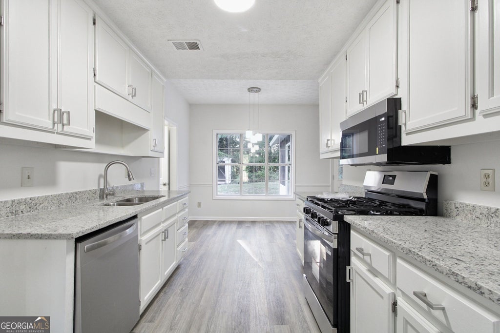 Photo of 6833 Sarah Jane Lane, Riverdale, GA 30296 (MLS # 10874813)
