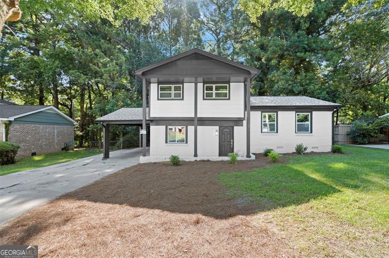 Welcome to this beautifully remodeled home. This property features 4 bedrooms and 3 full bathrooms, offering both comfort and style. Enjoy peace of mind with a brand-new roof and HVAC system. The interior boasts luxury LVP flooring, updated lighting and fixtures, and a designer kitchen with new cabinets, quartz countertops, and stainless steel appliances. The master suite includes a walk-in closet and a stunning spa-like bathroom complete with brass fixtures, a free-standing tub, and porcelain tile. Every detail has been carefully curated to create a warm and inviting space at an affordable price. Conveniently located just 20 minutes from Downtown Atlanta and Midtown, this home offers easy access to dining, shopping, and major highways while nestled in a quiet, established neighborhood.