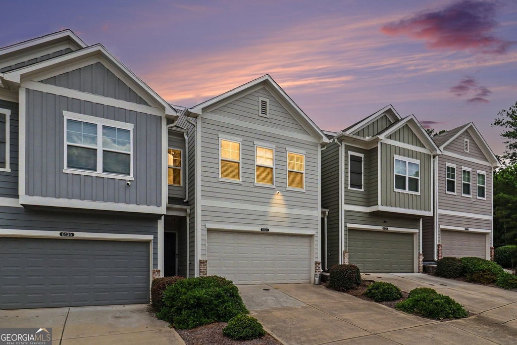 Photo of 6131 Centennial Run, Atlanta, GA 30349 (MLS # 10839709)