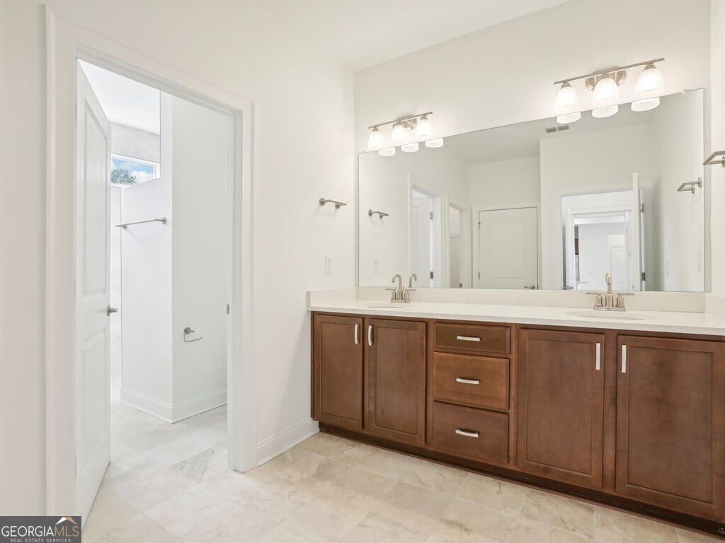 Photo of 200 Persimmon Drive, Holly Springs, GA 30115 (MLS # 10843893)