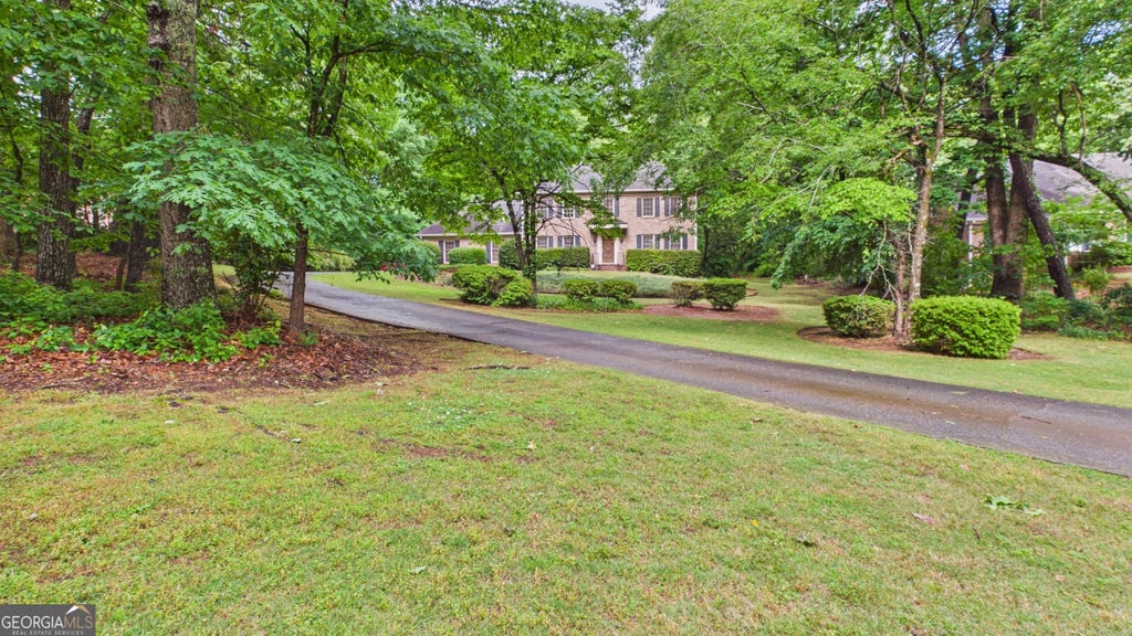Photo of 2597 W Harvest Drive SE, Conyers, GA 30013 (MLS # 10817350)