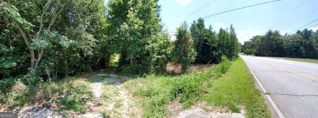 This 5.7 acre corner lot is ready for you! It is zoned for AG1 residential agricultural and commercial. Boasting major frontage on both Bohannon and Oakley Industrial Blvd this property provides easy and quick access to Interstate 85, Hwy 92, 74, 29, and 14.