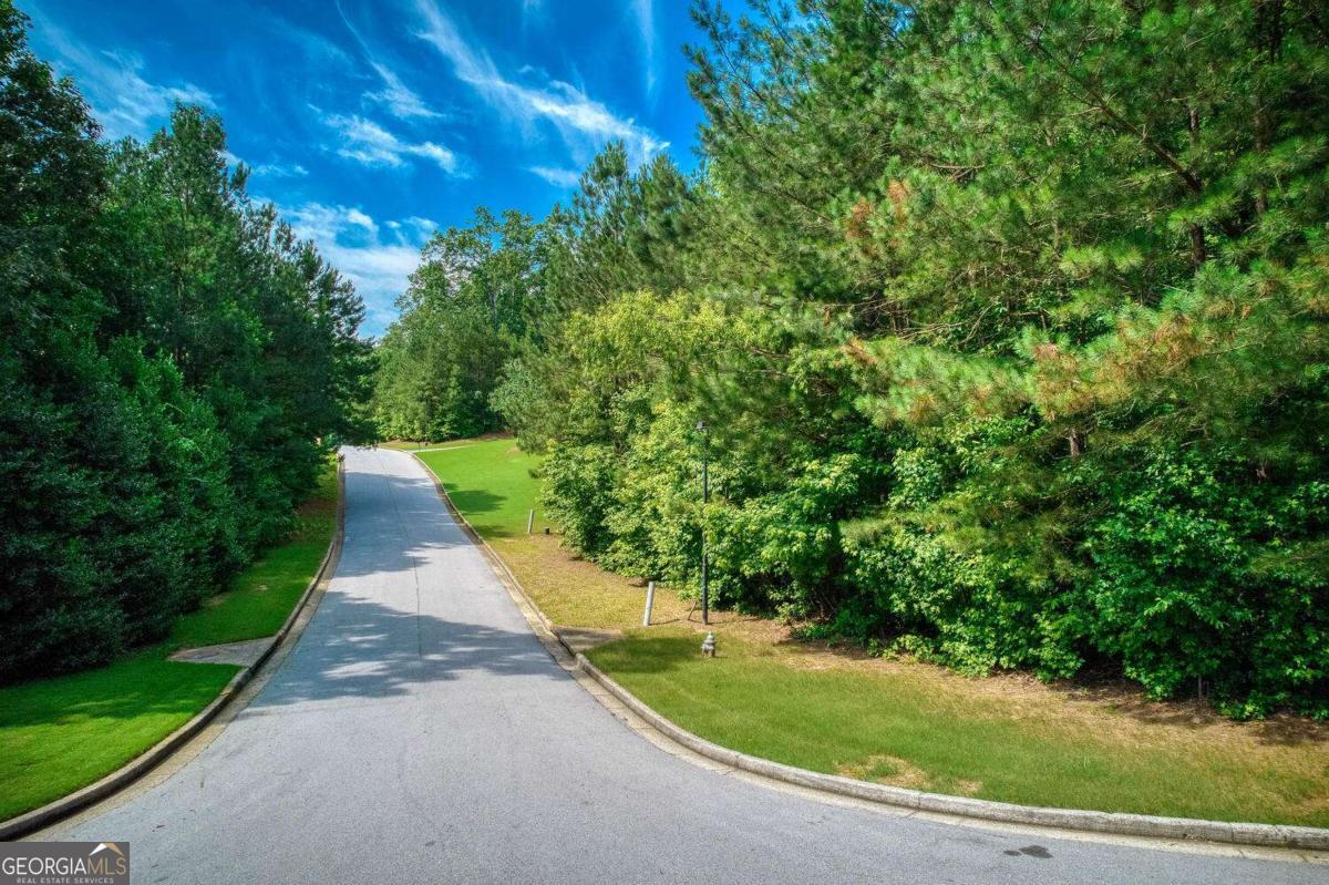 Beautiful cul-de-sac lot in the highly desirable Senators Ridge community in North Paulding. Located in Phase 3 of this gated subdivision, this large lot offers privacy and access to resort-style amenities including 2 swimming pools, clubhouse, tennis & basketball courts, playground, and picnic area. Top-rated North Paulding schools! Just 15 minutes to Dallas, Acworth, and Cartersville with easy access to Cedarcrest Rd and Hwy 41/Cobb Pkwy for shopping and dining. Enjoy nearby outdoor recreation at Red Top Mountain, Pickett's Mill, and Kennesaw Mountain. Community features include underground utilities, curb & gutter streets, HOA with covenants, and a community website with newsletters. Build your dream home in this scenic, amenity-rich neighborhood!