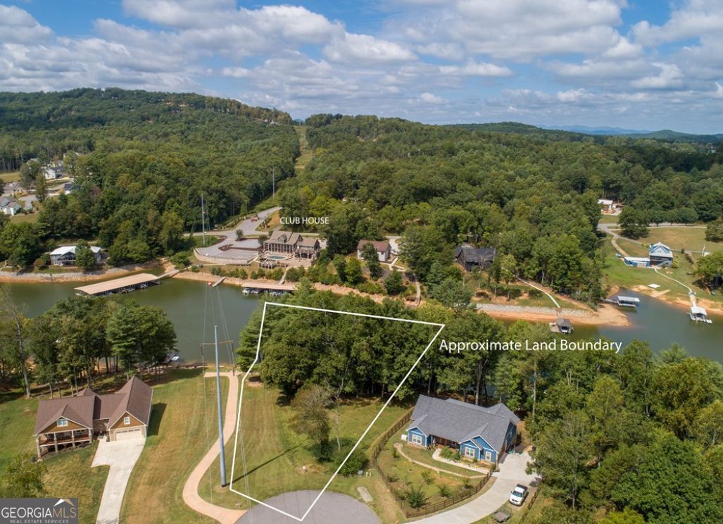 Huge price reduction. Get YOUR lake lot now. Build your custom dream home on Lake Nottely. Deep water lot in amazing gated community, with great amenities (including a community clubhouse, infinity pool, movie theater and gym) and a low HOA. Beautiful lake views. Enjoy peaceful serenity in the North Georgia Mountains.