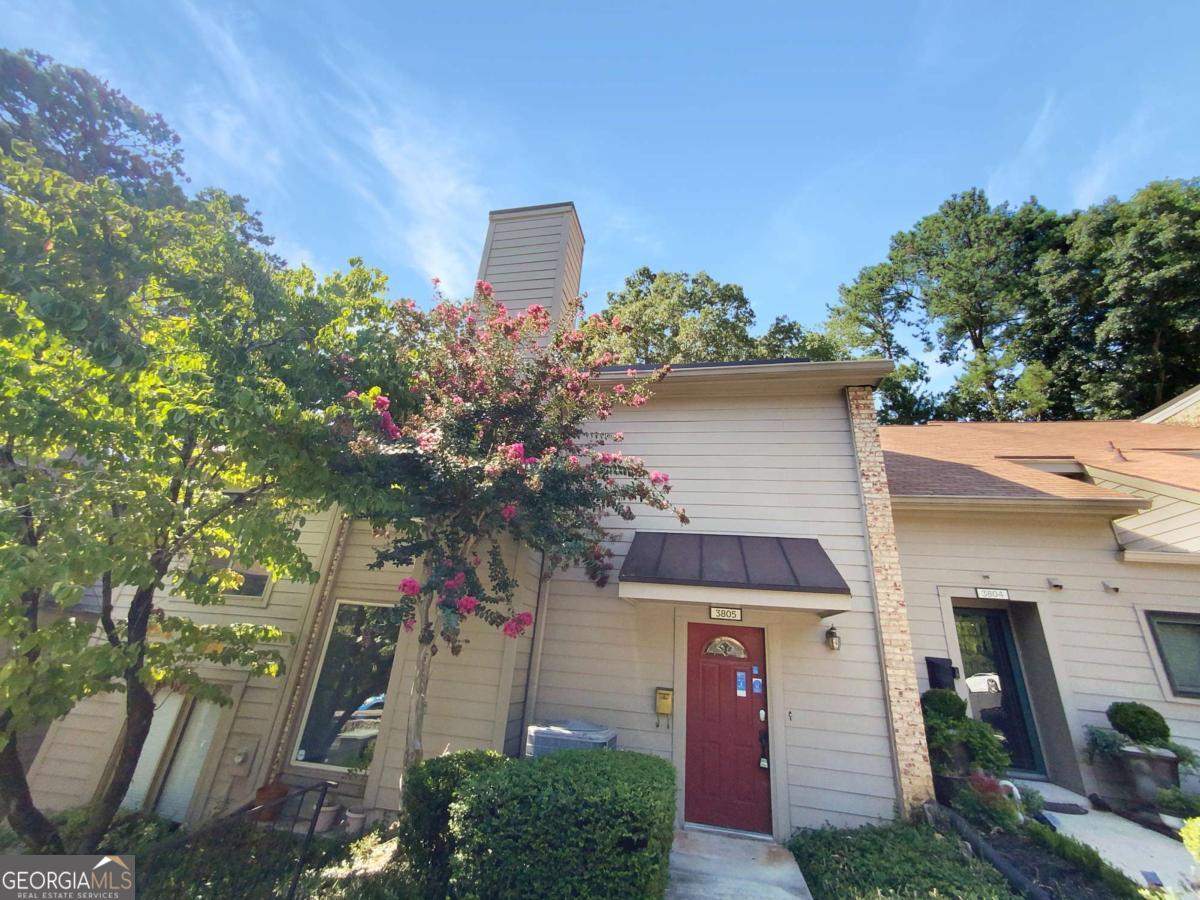 Welcome to this beautifully maintained 3-bedroom, 2.5-bathroom townhome in the highly sought-after Vinings Proper! Tucked away in a quiet, well-kept neighborhood just minutes from all that Vinings has to offer, this home combines modern convenience with an unbeatable location. Step inside to an open and inviting floor plan featuring a bright family room with a cozy fireplace and double sliding glass doors that fill the main living area with natural light and provide seamless access to the private patio-perfect for morning coffee or evening relaxation. The dining area flows effortlessly into the kitchen, which features white cabinetry, a tiled backsplash, breakfast bar, and ample storage space. Upstairs, retreat to the spacious primary suite with a walk-in closet and an updated en-suite bathroom. Two additional guest bedrooms share a well-appointed full bath, providing plenty of space for family, guests, or a home office. The entire home has been freshly painted, creating a crisp and clean aesthetic throughout. Enjoy low-maintenance living with an HOA that covers exterior maintenance, roof, water, sewer, trash, termite bond, pool access, and more-giving you peace of mind and more time to enjoy your surroundings. Ideally located just minutes from Truist Park, The Battery, Cumberland Mall, Vinings Square, and the scenic Chattahoochee River trails, with easy access to I-75 and I-285 for a quick commute. Don't miss this opportunity to own a move-in ready home in one of Atlanta's most desirable areas-schedule your tour today!