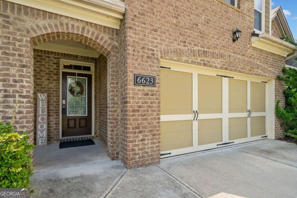 Photo of 6623 Rivergreen Road, Flowery Branch, GA 30542 (MLS # 10794334)