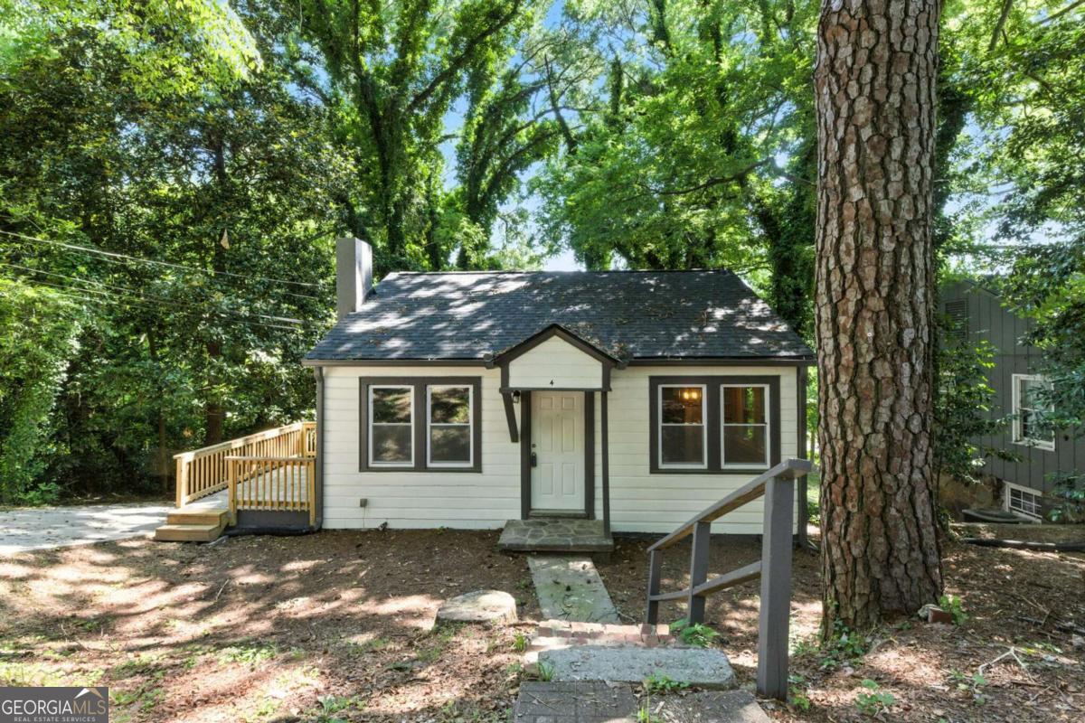 Stunningly renovated 3 bed/1 bath home featuring brand new Luxury Vinyl Plank flooring in the basement, refinished hardwoods, brand new 30-yr Architectural Roof, new HVAC, new interior and exterior paint, new lighting and plumbing fixtures everywhere, new granite countertops in kitchen and bathrooms, and new stainless-steel appliances. Enter into the large living room with fireplace and open views to the kitchen. Kitchen offers new granite, plenty of cabinets and countertops space, stainless steel appliances, and separate dining area. Two bedrooms on the main level and full bath offering tub shower combo with tile surround. In the basement you will find one bedroom/recreation area in the basement with large garage/storage area. Large deck on the side of the house.