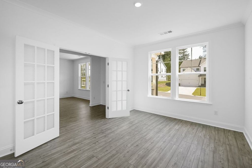 Photo of 8690 Stratford Oaks Avenue, Ball Ground, GA 30107 (MLS # 10664285)