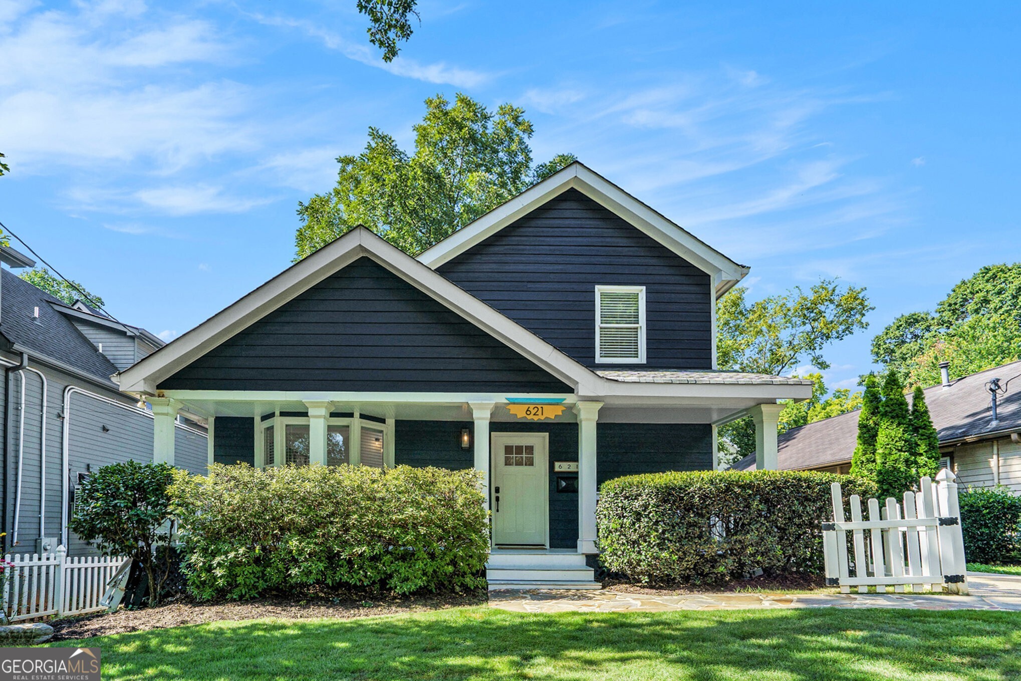 Renovated Grant Park Charmer Just Steps from the Southside BeltLine! Welcome to the heart of Grant Park, where curb appeal and charm meet unbeatable convenience. This lovingly maintained home offers the best of Intown living just moments from BeltLine favorites like Finca to Filter Coffee, Mellow Mushroom, Side Saddle Wine Bar, Grant Park Market, The Beacon, Little Tart Bakeshop, and Ollie's Market & Deli. From the White Picket Fence to the manicured Front Lawn and inviting Covered Front Porch, this home is picture-perfect. Inside, you'll be greeted by Soaring Ceilings with Skylights that invite in Natural Light, paired with rich Dark Hardwood Floors and crisp White Walls. A striking Stone Herringbone Fireplace anchors the living room and opens to the Dining Area and spacious Kitchen with White Cabinets, Granite Countertops, a classic Subway Tile Backsplash, and a Breakfast Bar plus space for a cozy Breakfast Table with views of the backyard. A convenient Main Level Bedroom and Full Bathroom offer flexible space for a Guest Suite, Home Office, or Playroom. Upstairs, the renovated Primary Retreat features a stylish Ensuite Bathroom with a Marble Double Vanity, Stone Tile Flooring, and a Frameless Glass Shower sleek, serene, and functional. A spacious Walk-In Closet adds to the comfort. Two additional upstairs Bedrooms share another Renovated Full Bathroom, ideal for guests, a nursery, or second workspace. Step outside to a dreamy Screened-In Porch with a Vaulted Beamed Ceiling and Ceiling Fan perfect for Game Day lounging or year-round Al Fresco Dining. The attached Deck is great for Grilling, while the Flat Grassy Yard and Storage Shed complete this private outdoor oasis. And the location? Truly unbeatable. Right across the street from Grant Park, Zoo Atlanta, and top amenities like Tennis Courts, Sports Fields, a Community Pool, and a Playground. Enjoy easy access to Glenwood Park, East Atlanta Village, and some of Atlanta's Best Dining including Gunshow, Talat Market, Breaker Breaker, Little Bear, Muchacho, Banshee, Argosy, and Pollo Primo. Downtown Atlanta and the airport are just a short drive away. This isn't just a home it's a Lifestyle full of Charm, Community, and Unmatched Convenience in one of Atlanta's Most Beloved Neighborhoods.
