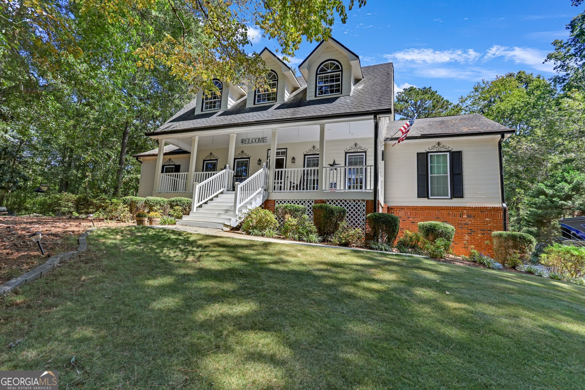 Custom Cape Cod 5BR/3BA on .62 acres in a cul-de-sac backing to Big Haynes Creek. Fresh interior & exterior paint, new insulated garage doors, and an in-ground pool with brand-new liner. 5+ car garage with workshop plus 50-amp service charger for 40-ft motorhome. Gourmet kitchen with vaulted ceiling, SS appliances, granite, double ovens, oak cabinets & Italian tile floors. Owner's suite on main with spa bath jetted tub, seamless glass shower & bronze fixtures. Large laundry room with sink , front & back covered porches, and storage galore. Too many extras to list - must see!