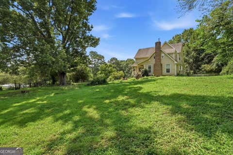 Photo of 1900 Redd Road, Milton, GA 30004 (MLS # 10822577)