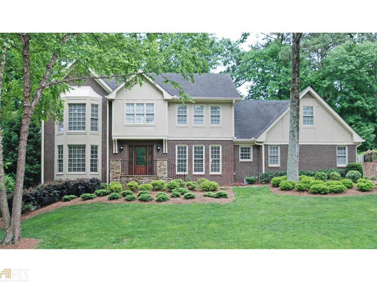 Beautiful home in popular swim/tennis neighborhood. There are so many things to love about this home, including: stacked-stone front stoop, hardwood floors on main level, updated kitchen with granite, large custom pantry, large custom laundry room, smooth ceilings on main level, screened porch, rear drive garage, level back yard, basement with large rec room, full bath, kitchenette, and additional room. The home has been meticulously maintained and all updates have been made with strict attention to detail.