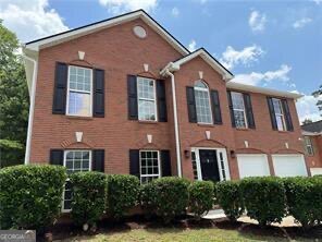 Welcome to this beautifully updated 4-bedroom, 2.5-bath home located in the desirable Fairington Farms community. This classic two-story brick residence offers timeless curb appeal and a spacious, functional layout perfect for families or entertaining. Step inside to discover fresh interior and exterior paint, new carpet throughout, and stylish new lighting fixtures that add a modern touch. The home also features brand-new appliances, making the kitchen ready for your culinary creations. Upstairs, you'll find generously sized bedrooms, including a spacious primary suite with a private bath and walk-in closet. The home offers plenty of room to live, work, and relax. With its recent updates and prime location, this home is move-in ready and a must-see!