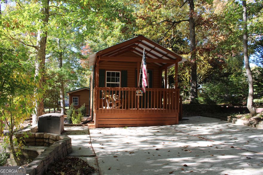 This cabin has been remodeled and ready for its new owner. Make this your Vacation home or live here in the North Georgia Mountains. This is  a Gated community, with a Fitness room open 24/7, swimming pool, and Clubhouse for activities. You're just a short drive to Helen, Cleveland, Clarkesville and Dahlonega. Abundance of outdoor adventures nearby including hiking, fishing, ziplining & tubing. There are many local wineries, unique shops and wonderful restaurants to visit as well.