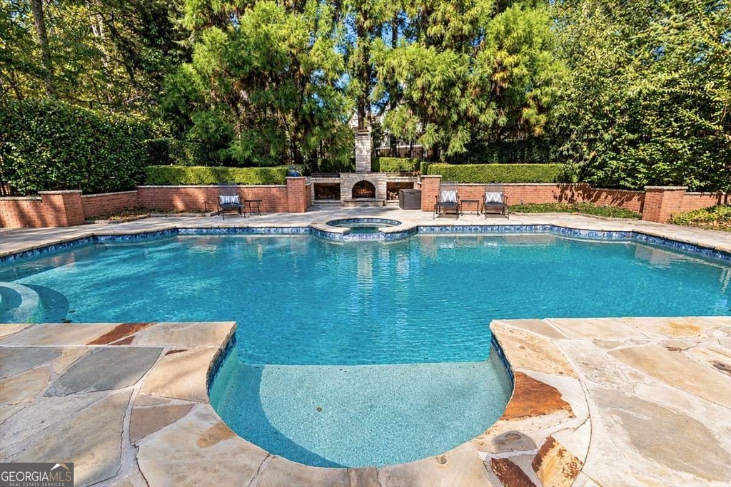 Photo of 6070 Greatwood Terrace, Alpharetta, GA 30005 (MLS # 10877754)