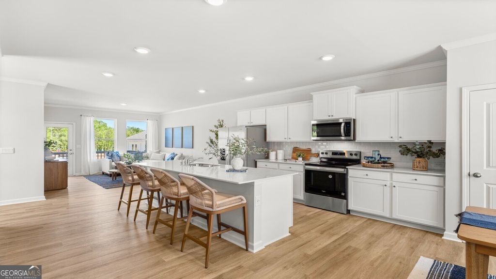 Photo of 6728 Leigh Street, Flowery Branch, GA 30542 (MLS # 10658109)