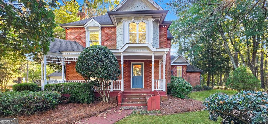 Stunning One-of-a-Kind Brick Home in the Desired Ola School District    Located in beautiful Henry County, this 1,934-square-foot brick masterpiece is truly one of a kind-overflowing with architectural glamour and timeless craftsmanship. From the custom brickwork and walkways to the exquisite wood detailing throughout, every feature of this home reflects elegance and character, including leaded stained glass! Enjoy cozy evenings by the fireplace, quiet mornings on the stunning front porch, and the convenience of a 2, yes 2 detached garages that perfectly complements the home's classic charm.    While the home has experienced a rough six months with renters who took a toll, its strong bones and unique beauty remain intact. With a little work, this gem will once again shine-ready to return to its full glory within weeks!