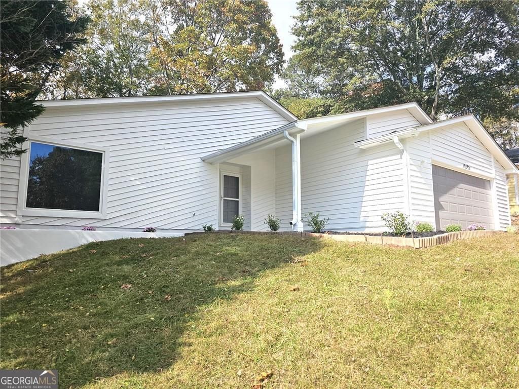 Photo of 10085 Old Woodland Entry, Johns Creek, GA 30022 (MLS # 10726420)