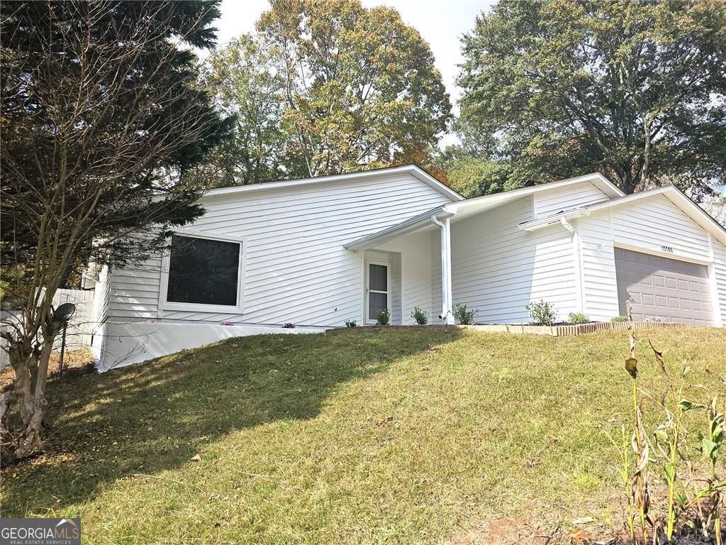 Photo of 10085 Old Woodland Entry, Johns Creek, GA 30022 (MLS # 10726420)