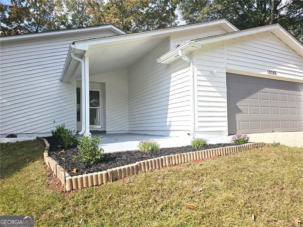 Photo of 10085 Old Woodland Entry, Johns Creek, GA 30022 (MLS # 10726420)