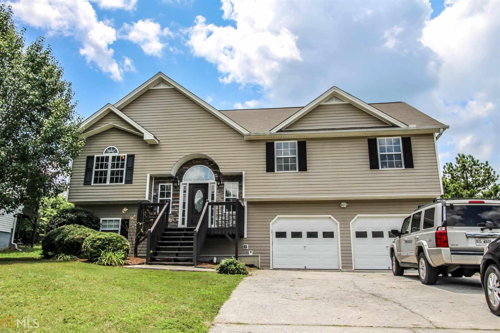 Lots of space in this 4BR/3BA traditional home! Large family room, separate dining, rock fireplace. Master bath includes separate tub shower. Basement has full bath, bedroom, and a bonus room. Fenced backyard and large covered deck. Swim/Tennis Community