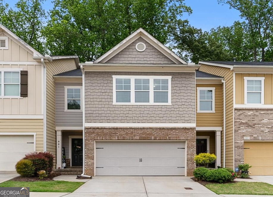If convenience is what you're looking for, this Marietta townhome is exactly where you want to be-just minutes from Marietta Square, The Battery Atlanta/Truist Park, Kennesaw Mountain, and with easy access to I-75. This move-in ready home features fresh paint, new carpet, engineered hardwoods on the main level, and a fully finished basement with a bedroom and full bath-ideal for guests or a home office. The kitchen includes granite countertops, a walk-in pantry, and opens to the breakfast area and cozy family room with gas fireplace. Enjoy a private, level backyard with no rear neighbors. The owner's suite offers a sitting area and double vanity en suite, plus spacious secondary bedrooms with walk-in closets. HOA includes lawn maintenance.