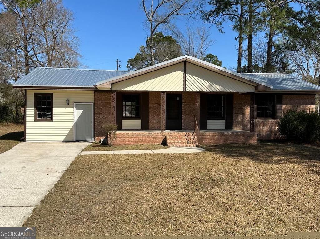 Photo of 1220 Poplar Avenue, Nashville, GA 31639 (MLS # 10629602)