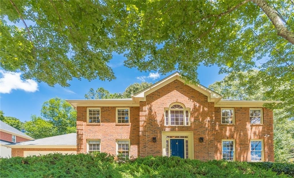 Looking for a spacious home convenient to several popular areas including Marietta & Roswell? This home may be just what youGÇÖre looking for! YouGÇÖre welcomed into a grand foyer with upgraded hardwood floors. Throughout the home are many gorgeous features such as a wood-paneled study, a jacuzzi tub in the master bathroom, and a modern dining room. The living room features a brick fireplace, built-in shelving, and abundant natural light. At the heart of the home is the kitchen with an eat-in breakfast area.The home has four bedrooms and two and a half baths including a large master with a walk-in closet. The daylight basement would be perfect for a playroom, office, or home gym. Enjoy summer nights grilling out on the beautiful back deck overlooking the wooded backyard. Located conveniently nearby the shopping, restaurants, and parks of Marietta, Alpharetta, Roswell, and Sandy Springs.