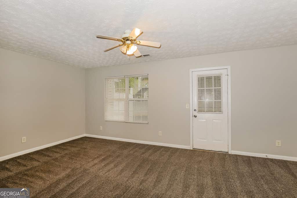 Photo of 11418 Ashefield Lane, Hampton, GA 30228 (MLS # 10820351)