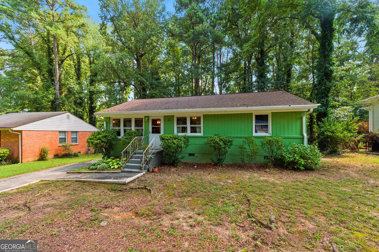 Discover the potential of this classic ranch-style retreat, perfectly situated in a well-established neighborhood in the rapidly growing city of East Point. Step inside to find an L-shaped living and dining area, complemented by a spacious family room conveniently located next to the owner's suite. The unfinished 6-foot-high basement provides over 400 square feet of storage and was professionally waterproofed by Aquaguard in 2021 with a transferable warranty. Additional peace of mind comes with a 3-year-old water heater and a 6-year-old roof. This home offers excellent convenience-just minutes from public transportation and Hartsfield-Jackson Atlanta International Airport. Plus, enjoy all that East Point has to offer, from boutique shopping and unique dining in the Downtown District to the vibrant Virginia Avenue corridor and Camp Creek Marketplace. The possibilities are endless-make this timeless home your next retreat!