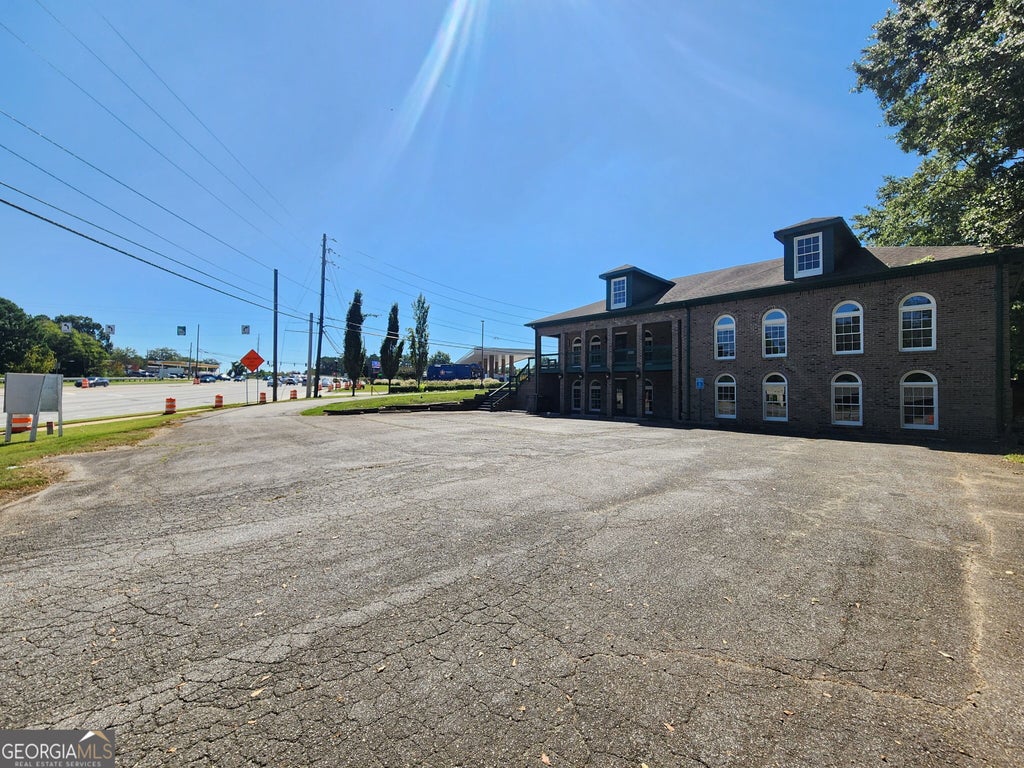 Photo of 4980 Nelson Brogdon Boulevard #C, Sugar Hill, GA 30518 (MLS # 10846001)