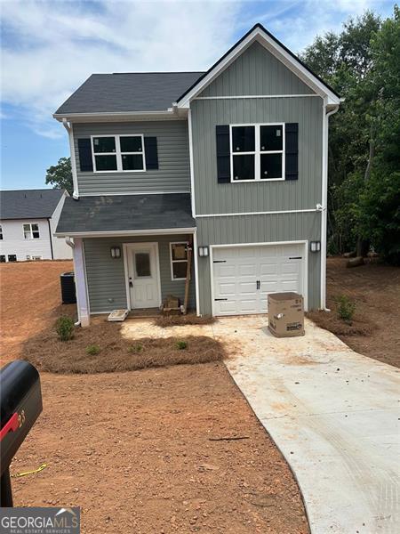 NO HOA. Nestled in the foothills of Toccoa in the North GA mountains, The Tara Hills plan is beautifully laid out with all bedrooms being on the second level opening up the main floor for an open floor plan making this home perfect for families and entertaining. All of the modern finishes you would expect in a new home from the high end LVP flooring to the granite counter tops. The laundry room is conveniently located on the second level for ease of access from all bedrooms. Don't miss your opportunity for affordable country living in rural Toccoa!