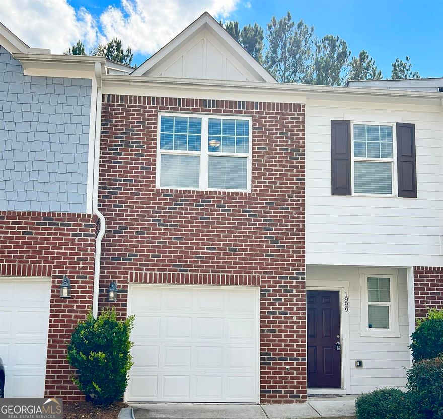 Back on Market: Buyer financing fell through. Welcome to this beautiful, energy efficient townhome in The Villages at Travers Creek. This two bedroom, two and a half bath home features spacious, double master bedrooms with their own private ensuites, offering privacy which is most desired in townhome living. The kitchen and living room have an open floor concept, perfect for entertaining Guests during the holidays. The kitchen has granite countertops, plenty of cabinet space, and a breakfast area for an early morning cup of coffee or for a weekday, full-course meal. To top it off, the entire home is newly painted, has new hardwood flooring on the main level, is energy-efficient, and has freshly cleaned carpet. There is also a cozy, private patio that is perfect for watching the sun set or cozying up to a great book. The Villages at Travers Creek community has an HOA that provides maintenance structure and ground services, and is 25 miles east of Downtown Atlanta with easy access to interstate 20.