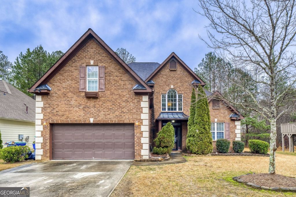 Photo of 4110 BigSage Dr, Atlanta, GA 30349 (MLS # 10694950)