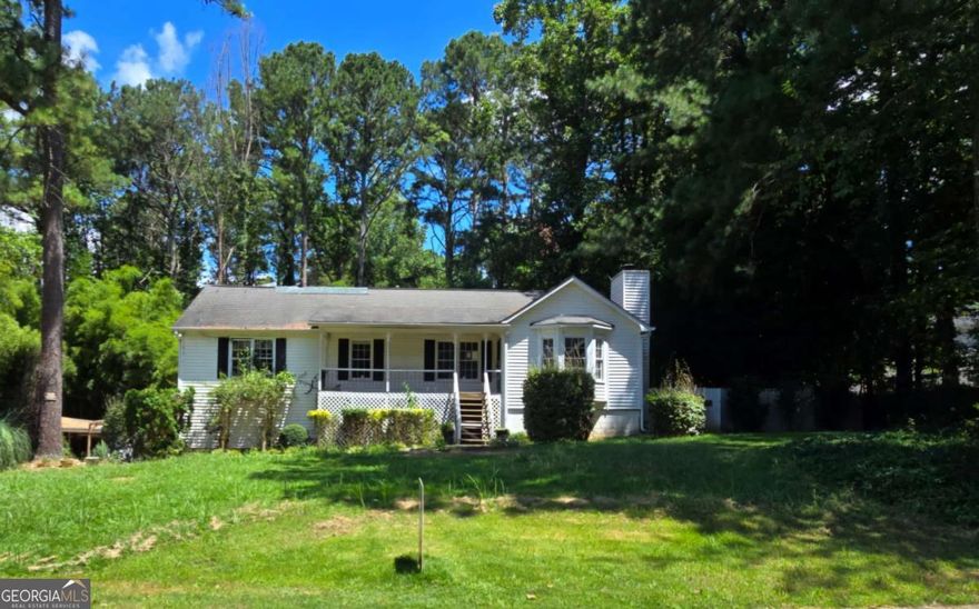 204 Captains Quarters, Woodstock, GA - A versatile ranch-style property brimming with potential. This inviting home offers three bedrooms and two baths on the main level, plus a full basement with an additional bedroom and bath-ideal for guests, remote work, or even a private suite. From the kitchen, step out onto a deck overlooking your private backyard, the perfect spot for morning coffee, outdoor dining, or peaceful evenings surrounded by nature. A 2-car garage, spacious yard, and dedicated workshop add even more value.    Set on a serene half-acre in a stable, established neighborhood, this home is sold as-is but with lots of potential-a rare opportunity to renovate and truly make it your own. With solid bones and a flexible floor plan, it's the perfect canvas for your vision.    Just minutes away, enjoy Lake Allatoona and Red Top Mountain State Park for boating, beaches, and hiking, or explore Dupree Park, Lewis Park, and the Noonday Creek Trail for everyday recreation. Shopping and dining are a breeze at the Outlet Shoppes at Atlanta and the lively Towne Lake area, while local attractions like Dixie Speedway add even more excitement.    With its prime location, expansive potential, and endless lifestyle perks, this is more than a house-it's a chance to create the dream home you've been waiting for.  Home is being Sold AS-IS with NO seller's disclosure statement; NO blind offers, All offers must be  entered through propoffers site. - An offer management fee of $200 (plus sales tax, where applicable) is charged by Pyramid Platform in  connection with the use of Propoffers site. This fee will be paid at closing from the Broker representing the buyer as selling agent or  transaction broker. - Subject to seller addendum - For financed offers EMD to be 1% or $1000 whichever is greater and for cash offers EMD  to be 5% or $5000 whichever is greater. - All offers are subject to OFAC clearance. - A viewing release must be signed and returned to our  office before showing this property. ***  Buyer or/and buyer's Broker must verify the accuracy of all the information regarding sq. footage, lost size and etc.  *** Please email listing broker to request Hold harmless agreement that must be signed before showing the property***  - This property is eligible under the First Look Initiative which expires after 30 full days on market. No investor offers until first look period expires.    No offers regardless of buyer type will not be negotiated within the first 7 days of listing.