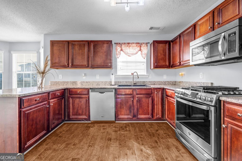 Photo of 1903 Cobblestone Ct, Conyers, GA 30012 (MLS # 10655538)