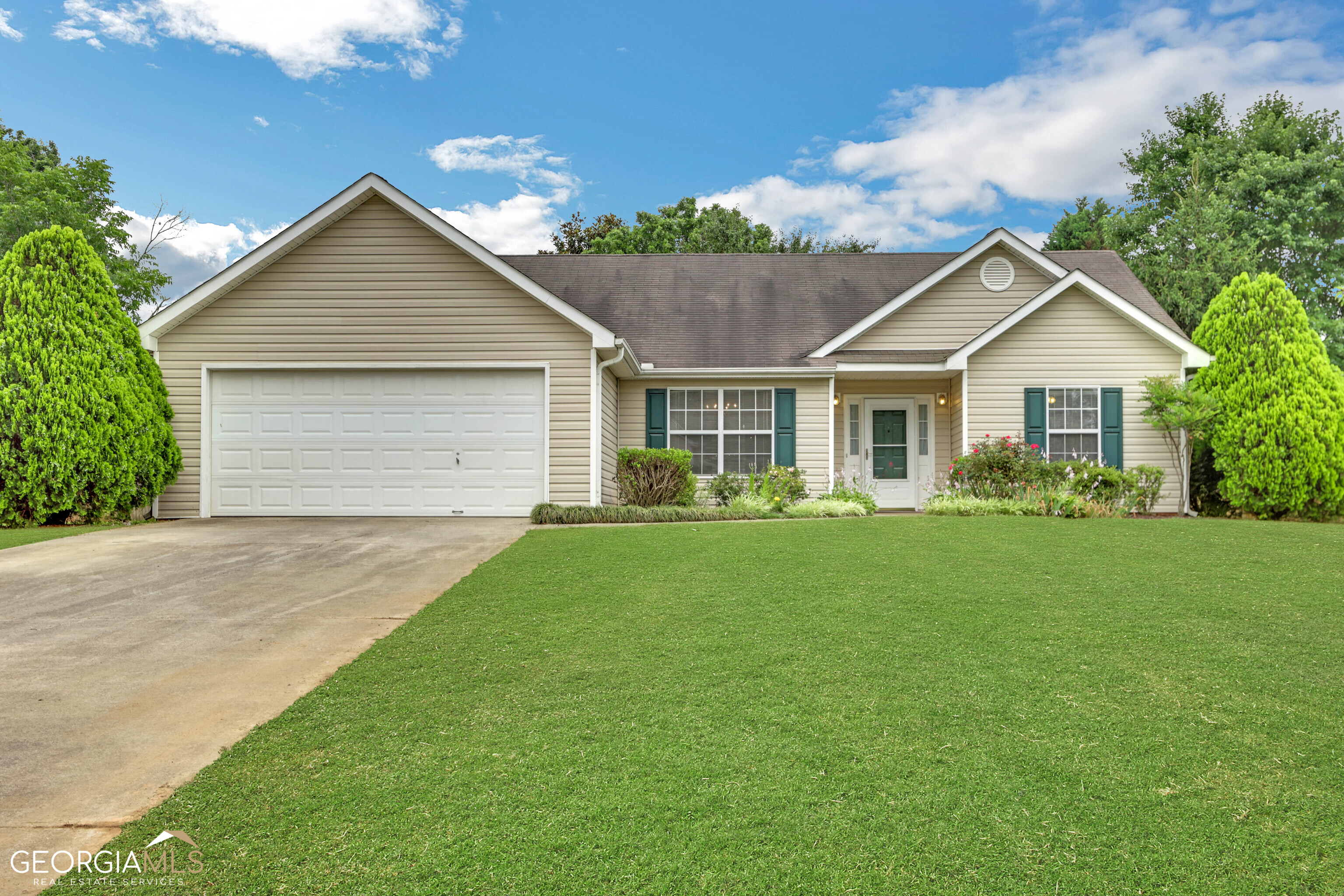 Welcome Home to a wonderful ranch. Easy one floor living and a great split bedroom floor plan. This home has an open plan with a little privacy wall in the kitchen. The Primary Bedroom has a four piece ensuite and the secondary bedrooms share a hall bathroom. The sunroom overlooks the backyard. The backyard has a storage shed and raised garden beds ready for you to grow vegetables. Nice quiet neighborhood. Located Near shopping and Fort Yargo State Park