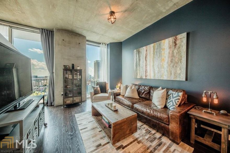 Enjoy the optimum Midtown living experience in this recently updated Viewpoint two bedroom residence. The second bedroom flex space is also ideal for a home office. This popular South facing floor floorplan (11 stack) offers the most dramatic views, with the maximum optimization of the living space. The center-piece of the recently renovated kitchen is a center island with immaculate granite counter top with custom cedar sides and stainless steel undermount farm sink. A premium stainless steel appliance package and grey solid wood cabinets complete the kitchen space.