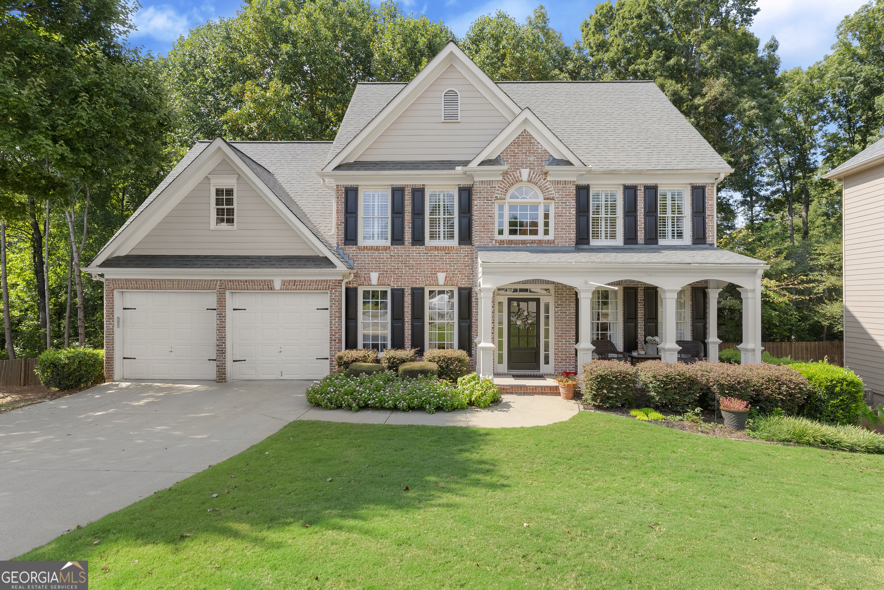 Sought-After Vanderbilt Subdivision in Sugar Hill Welcome home to this stunning 4 Bedroom, 3 1/2 Bath residence perfectly tucked away on a quiet cul-de-sac in one of Sugar Hill's most desirable neighborhoods. The spacious owner's suite is a true retreat, complete with an upgraded spa-like bathroom featuring dual vanities and two oversized his-and-her closets. Thoughtful details such as plantation shutters and outdoor landscape lighting add warmth and charm throughout. The home's inviting layout is ideal for both everyday living and entertaining. The finished basement with a full bath offers endless possibilities-boasting a huge recreation area, partial kitchen, extra finished room, and generous unfinished storage space. Step outside and enjoy not one, but two expansive decks (upper and lower), perfect for cookouts, gatherings, or simply unwinding while overlooking your serene backyard. Nestled in a top-rated school district and just minutes to shopping, dining, and entertainment, this home blends convenience and community with comfort and style. Don't miss your chance to call Vanderbilt Subdivision home!