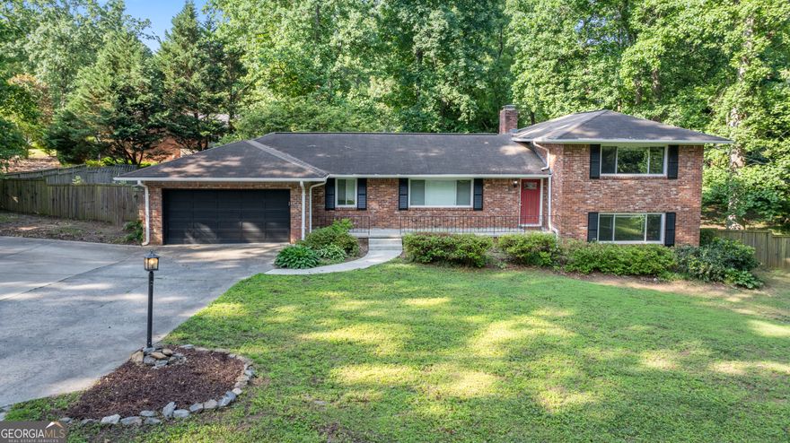 This home on a huge corner lot has everything you're looking for. Large open kitchen, dining room, and living room on the main floor. With steps down to oversize sunroom. Beautiful new windows, two car garage, two separate living areas with two bedrooms and full bath each. Plus large basement perfect for storage, workout room, office space, and/or workshop. Too many rooms to count. Hurry to make your appointment for this tremendous value in the Wheeler High School District.