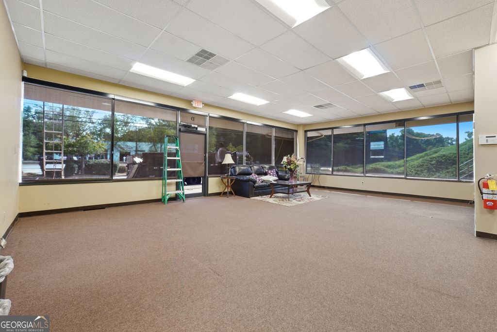 Photo of 5855 Old National Hwy #SUITE E, Atlanta, GA 30349 (MLS # 10792352)