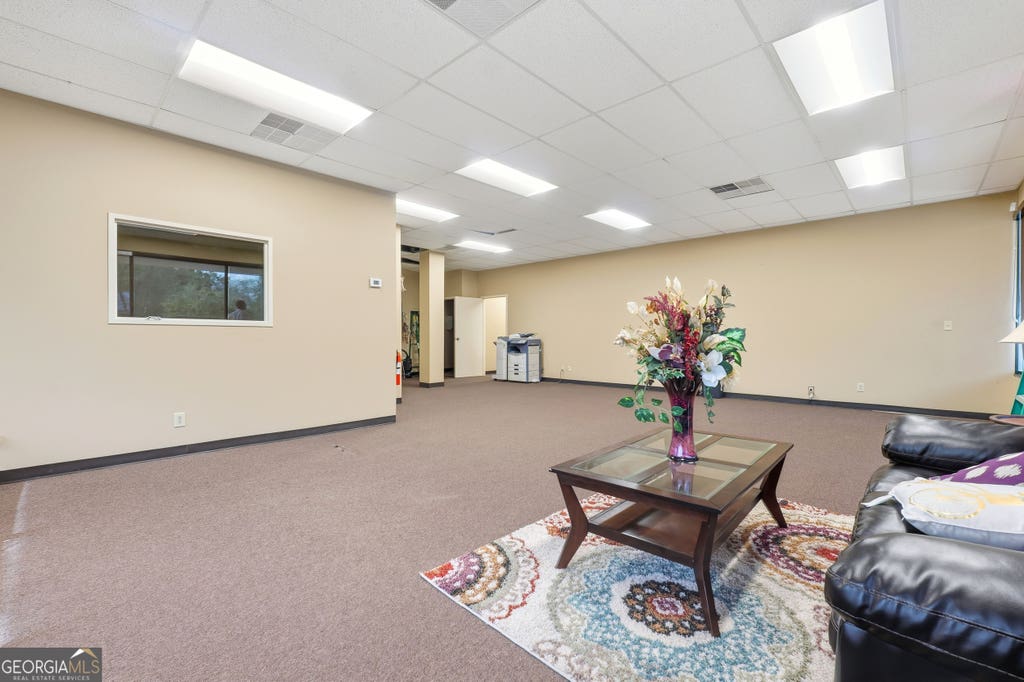 Photo of 5855 Old National Hwy #SUITE E, Atlanta, GA 30349 (MLS # 10792352)